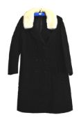 A ladie's Astrakhan style double breasted coat with mink collar,