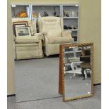 A large contemporary mirror along with a gilt acanthus leaf decorated mirror