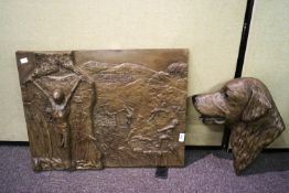 A Patsi Ann head of a Golden Retriever and another wall plaque
