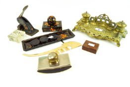 A brass inkwell and other items