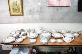 A Royal Doulton 'Burgundy' pattern dinner service