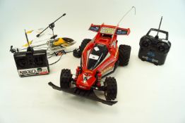 A Nikko radio controlled Rhino Aero and an RC helicopter