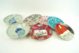 A Chinese porcelain plate and other plates