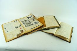 A group of assorted scrap books with various contents