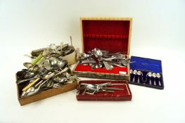 A collection of assorted silver plated and other flatware