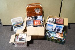 A quantity of DVDs and a Bush radio