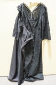 A long sleeved black lace and crochet evening dress,