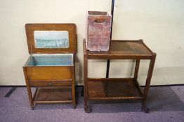 A 1930's oak sewing box and an oak trolley