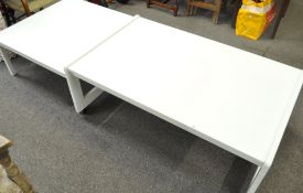 Two painted coffee tables, the largest rectangular one,