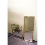 A gilt framed mirror together with a mirrored brass fire screen