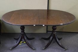 A mahogany twin pedestal dining table,