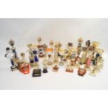A large collection of assorted trophies,