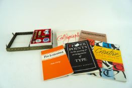 A calligraphy kit and books