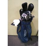 A golf bag and clubs