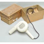 A boxed period Bakelite Supreme hair dryer