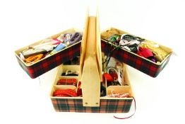 A retro sewing box and contents