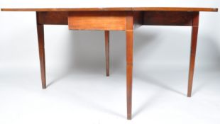 A 19th century mahogany drop leaf table on square tapering legs, 73cm high x 107cm wide x 50.