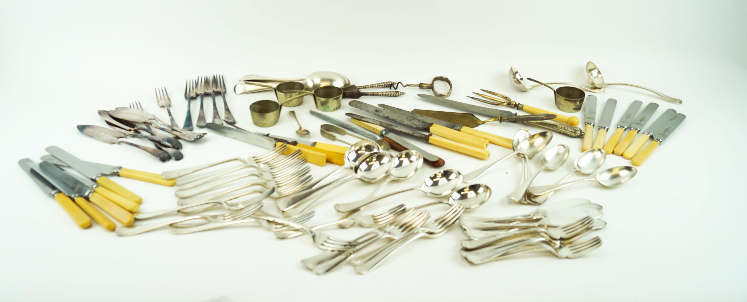 A group of silver plated flatware