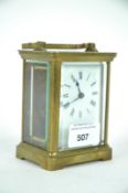 A brass cased five glass carrige clock,