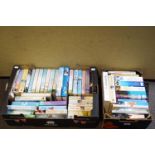 Two trays containing a mix of recently published hardback and paperback books all in good condition