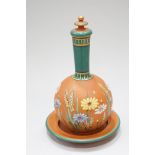 A redware bottle vase, cover and stand,