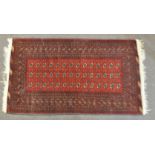 A Rajastani rug 20th century of rectangular form,