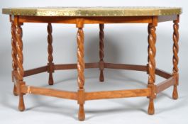 An octagonal brass topped barley-twist sofa table,