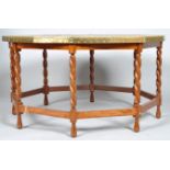 An octagonal brass topped barley-twist sofa table,