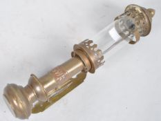 An antique style brass and glass railway carriage lamp, labelled G W R,
