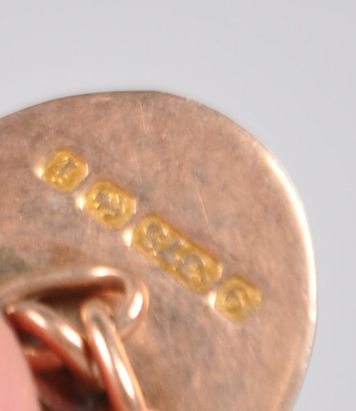 A pair of yellow metal cufflinks stamped 18ct together with two single cufflinks. - Image 2 of 3