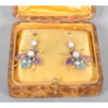 A pair of insect drop earrings set with pearls,