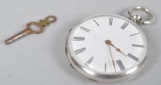A silver open face pocket watch. White circular dial (unsigned) with Roman numerals.