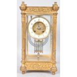 A late 19th century gilt four glass mantel clock,