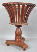 A mahogany jardiniere of open basket form with gadrooned edge,