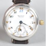 A Bravingtons Renown wristwatch. Circular white dial with numerical markings and second hand dial.