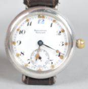 A Bravingtons Renown wristwatch. Circular white dial with numerical markings and second hand dial.