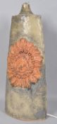 A Bernard Rooke Studio pottery table lamp base, decorated in relief with a flaming sun,