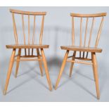 Two Ercol all purpose chairs,