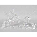 A Swarovski crystal figure of a unicorn 11cm high and a similar figure of Pegasus, 12cm high,