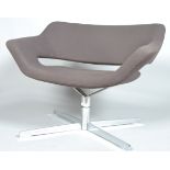 Hitch mylius, HM85, a contemporary designer swivel waiting chair, i taupe upholstery,