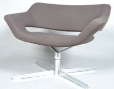 Hitch mylius, HM85, a contemporary designer swivel waiting chair, i taupe upholstery,