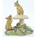 A Royal Doulton figure from the Wildlife collection of two mice on a mushroom, printed marks,