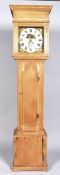 An early 19th century pine longcase clock,