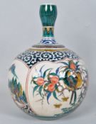 An Asian pottery onion vase, polychrome decorated with birds in a fruit tree and other vignettes,