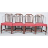 Four early 19th century mahogany dining chairs,