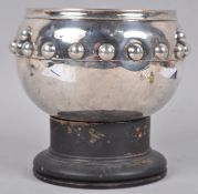 A large scale silver Glastonbury bowl of round form, applied with a band of hemispheres