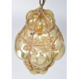 A glass and twisted wire pendant ceiling light,