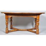 An oak refectory style extending dining table, 20th century,