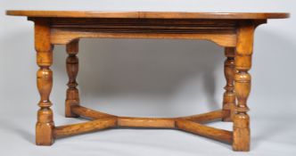 An oak refectory style extending dining table, 20th century,