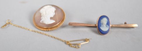 A hallmarked 9ct gold circular cameo brooch together with a wedgewood cameo bar brooch.